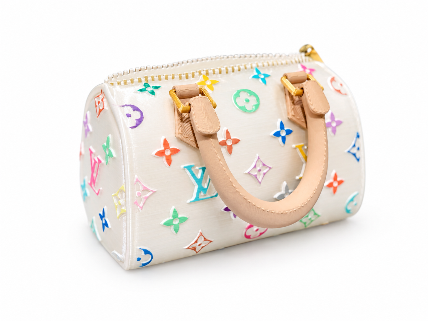 White purse vase with a multicolor pattern and tan handles